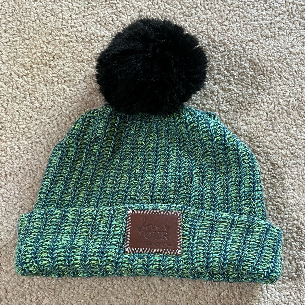 Love Your Melon green pom pom hat